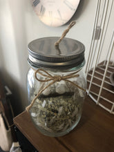 Hanging birds in a jar