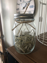 Hanging birds in a jar